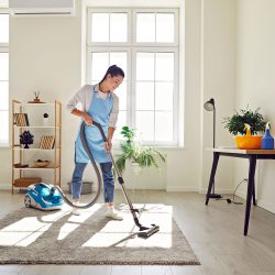 Home-Cleaning-Lady-Vacuuming